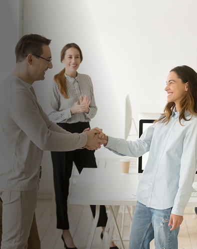 Team members receiving corporate gift cards as part of employee rewards and appreciation programs