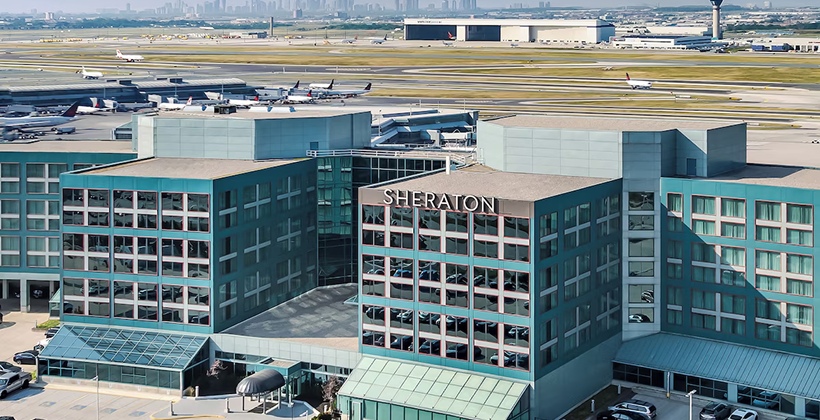 Sheraton Gateway Hotel exterior near the airport highlighting a partnership for visitor stays