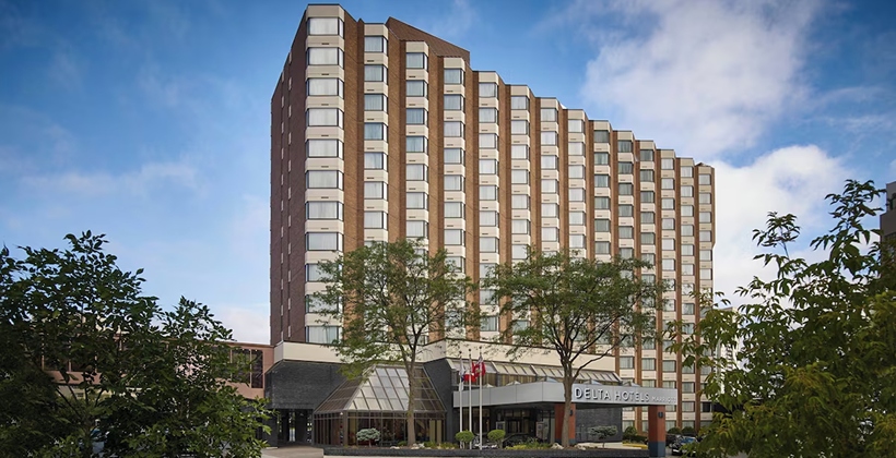 Delta Hotels by Marriott building exterior offering convenient access for a shopping stay