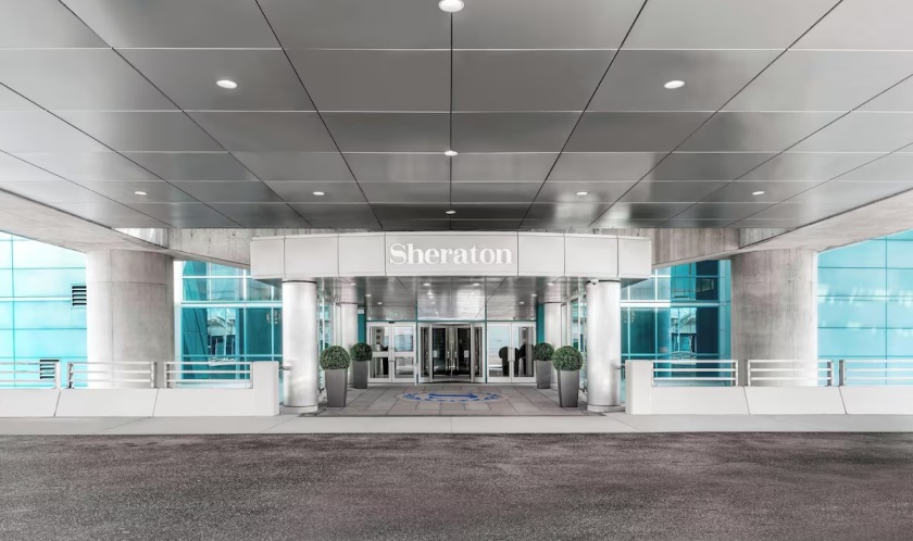 Hotel entrance connected to a shopping centre offering a convenient stay and shopping experience