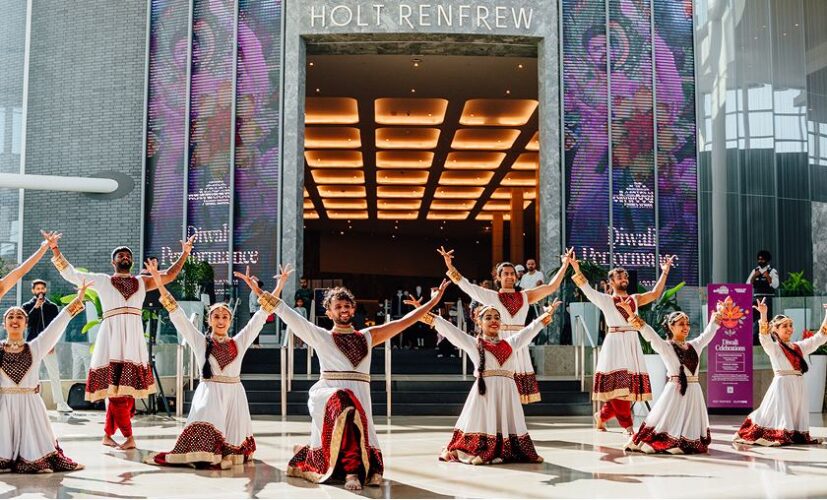 Cultural performance inside the mall highlighting community events and shared public spaces