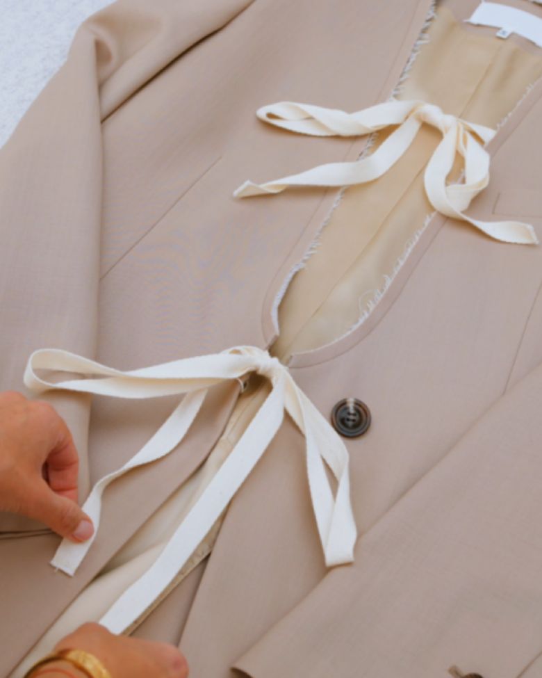Ribbon button coat