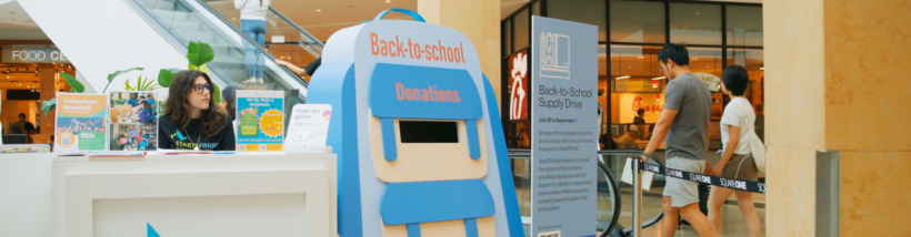Backpack shaped donation bin
