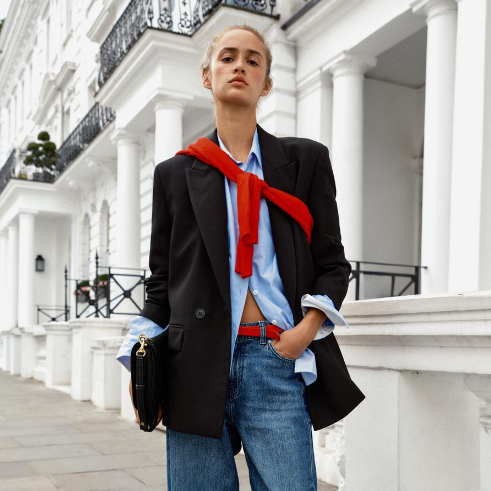 A woman wearing an oversized blazer
